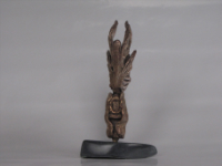 Ontpoppen.
materiaal brons